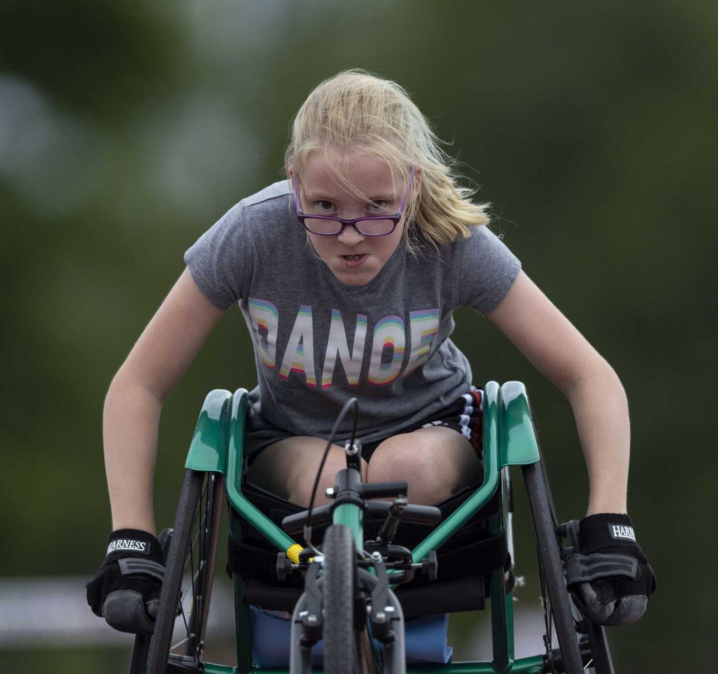 Wheelchair athlete with a determined look on her face
